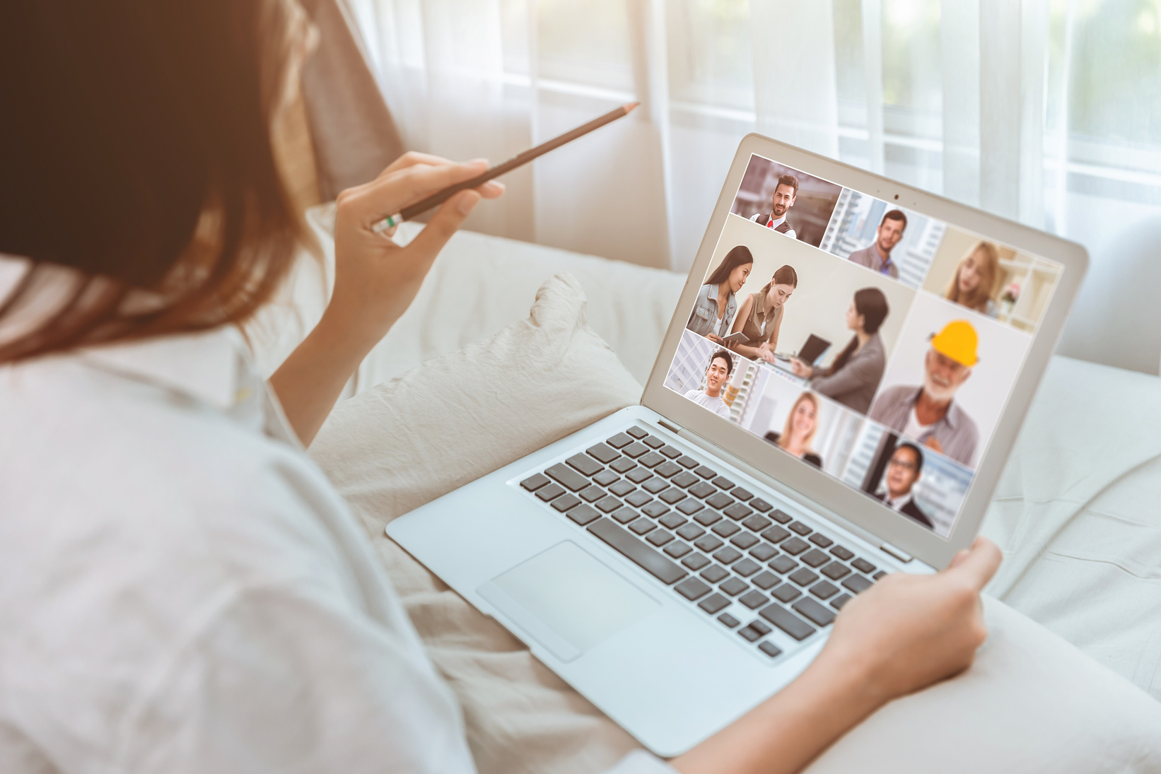 Business Women Stay Home Closeup Zoom Meeting Video Call with Business Partner with Laptop during Self Quarantine.